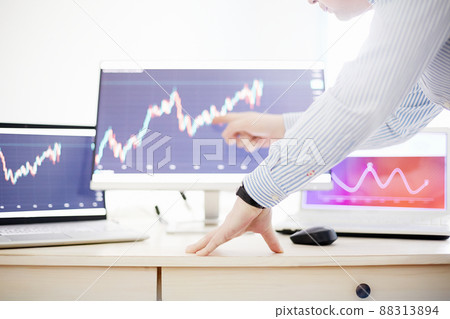 manager working in office, looking at graphs 88313894