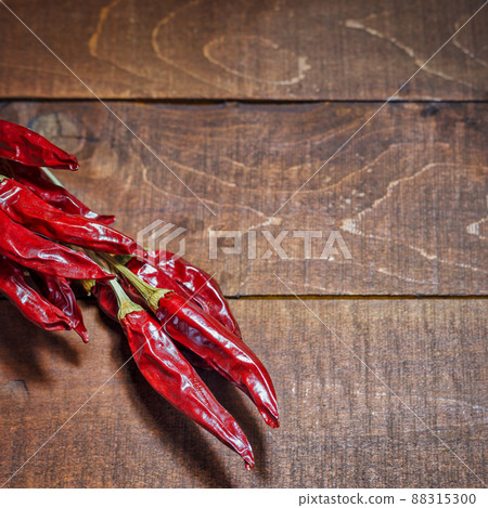 Red hot chili peppers on a wooden background 88315300