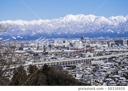 View of the snow-capped Kekatsu Sanzan and the Toyama city area from Mt. Kureha, a special seat in Tateyama Aogu. View of the snow-capped Kekatsu Sanzan and the Toyama city area from Mt. Kureha, a special seat in Tateyama Aogu. 88316938