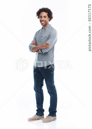 All you can be is yourself. Portrait of a handsome man with his arms crossed in studio isolated on white. 88317578