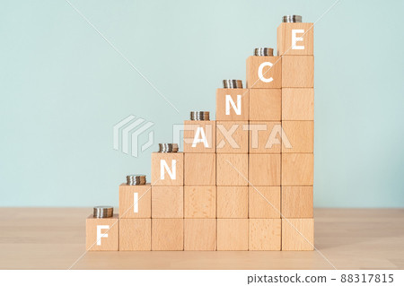 Image of finance | Building blocks and coins with "FINANCE" written on them 88317815