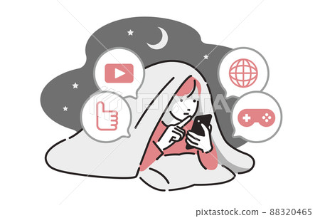 A girl who stays up late and is absorbed in a smartphone 88320465