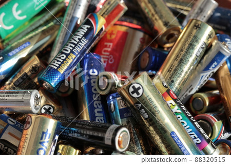 Many discarded batteries 88320515