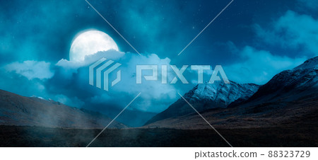Magical Night Scene with Full Moon in cloudy sky. Mountain Landscape from Yukon 88323729