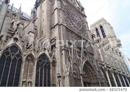 Rose window on the side of Notre Dame Cathedral in Paris, France Rose window on the side of Notre Dame Cathedral in Paris, France 88325470