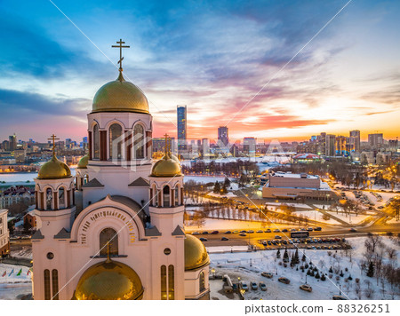Winter Yekaterinburg and Temple on Blood in beautiful pink and orange sunset. Translation of the text on the temple 88326251