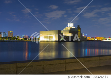 The Museum of Islamic Art (MIA) at night time in Doha, Qatar 88326317