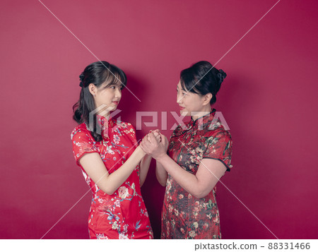 Cheongsam Chinese traditional flag, Asian mother's day portrait, crimson background, application to mother's day and sympathetic subject. 88331466