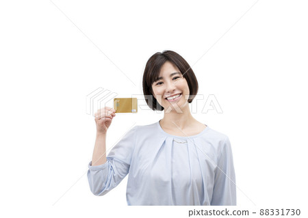 A young woman with a credit card 88331730