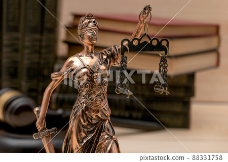 Lady Justice. Law symbols in bokeh background. 88331758
