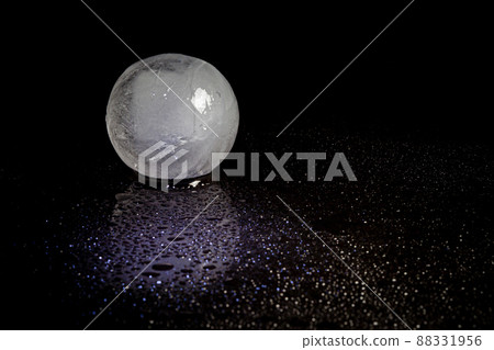 ice ball reflection on black background. ice ball reflection on black background. 88331956