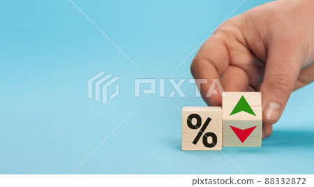 Cube block with percentage symbol icon. Interest rate financial and mortgage rates concept. Wood 88332872