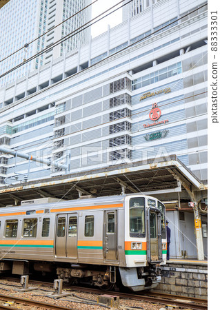 Chuo Line 211 series commuter train stopped at the platform of Nagoya Station Chuo Line 211 series commuter train stopped at the platform of Nagoya Station 88333301
