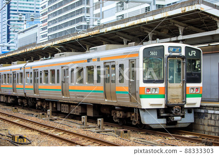 Chuo Line 211 series commuter train stopped at the platform of Nagoya Station Chuo Line 211 series commuter train stopped at the platform of Nagoya Station 88333303