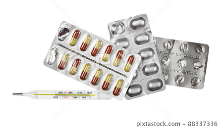 Pills in blisters and mercury thermometer isolated on white Pills in blisters and mercury thermometer isolated on white 88337336