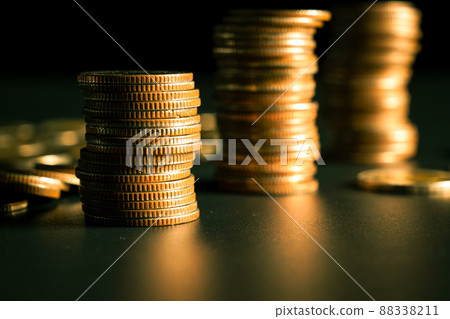 Pile of gold coins stack in finance treasury deposit bank account for saving Pile of gold coins stack in finance treasury deposit bank account for saving 88338211