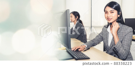 Business people wearing headset working in office broaden view 88338223