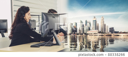 Business people wearing headset working in office broaden view 88338266