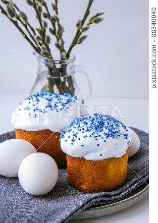 Easter eggs. Happy Day Bright Easter. Orthodox Easter holiday. Traditional food. Creative stylish trend Homemade easter cake. Selective focus 88340040