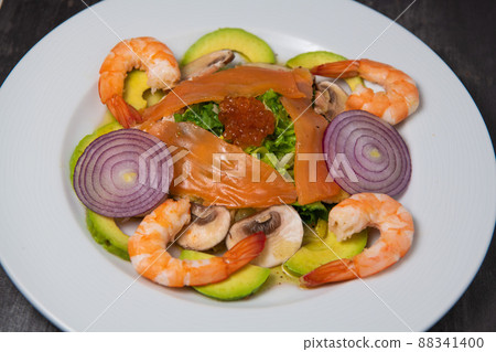 Healthy breakfast with salmon, salad, avocado mushroom, salmon egg, red onion 88341400