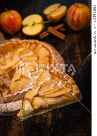 Delicious apple pie on a wooden table, from above 88341682