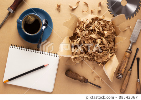 Woodworking carpenter chisel tool and wood shavings isolated at white background Woodworking carpenter chisel tool and wood shavings isolated at white background 88342367