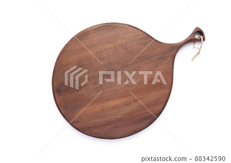 Cutting board isolated at white background. Wooden pizza board Cutting board isolated at white background. Wooden pizza board 88342590