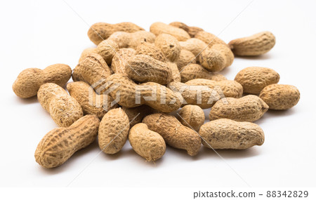 bunch of ecological peanuts on a white background bunch of ecological peanuts on a white background 88342829