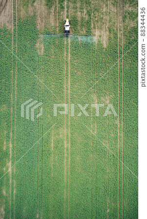 Treating green agriculture field Treating green agriculture field 88344436