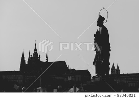 Statue of John of Nepomuk silhouette at Charles Bridge. Prague, Czech Republic Statue of John of Nepomuk silhouette at Charles Bridge. Prague, Czech Republic 88346821