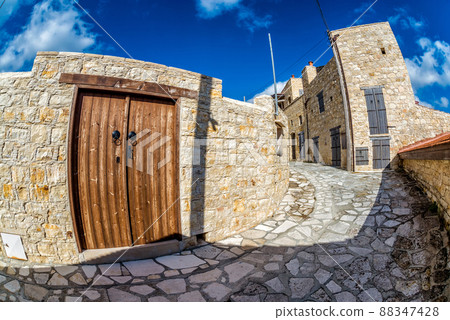 Sunny street in a small mediterranean village. Lofou, Limassol District, Cyprus 88347428