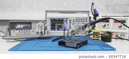 Power supplies and electronic measuring devices in the laboratory 88347716