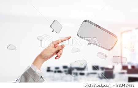 Female hand touching with finger glass icon fly in air. Mixed media 88348482