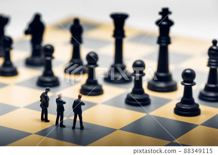 Businessmen on a chessboard. Business strategy concept 88349115