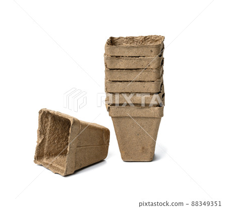 recyclable cardboard cups for planting seedlings and seeds isolated on white background. Ecological items, zero waste recyclable cardboard cups for planting seedlings and seeds isolated on white background. Ecological items, zero waste 88349351