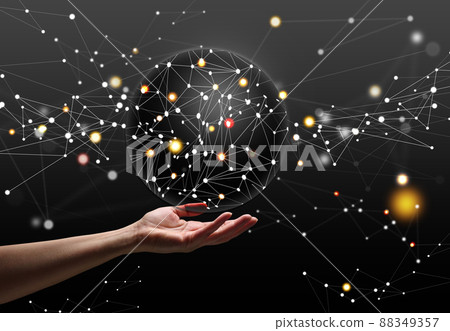a female hand holds a sphere with global international connections. Futuristic visualization of global business and world internet network 88349357