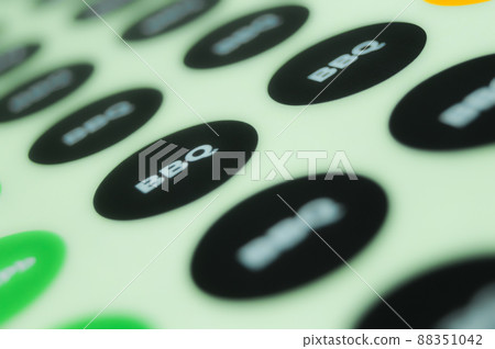 BBQ sticker, a self-adhesive label on a paper substrate. Print labels on a roll machine in a printing house. Selective focus BBQ sticker, a self-adhesive label on a paper substrate. Print labels on a roll machine in a printing house. Selective focus 88351042