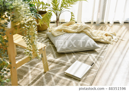 Pillow and soft blanket in relaxing space, Comfort living room with warm and cozy natural light 88351596
