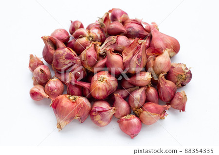 Shallots onion isolated on white background. Shallots onion isolated on white background. 88354335