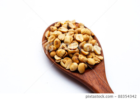 Roasted peanuts on white background. Roasted peanuts on white background. 88354342