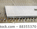 After laser cut steel plate on machine ; 88355370