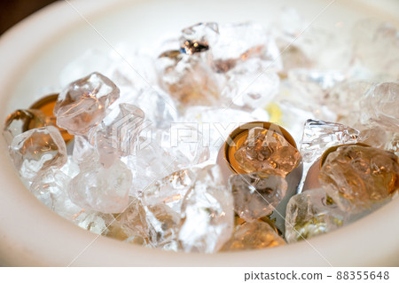 beer and beverage in the ice storage with the LED light hilight at the bottom ready to serve. 88355648