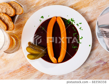 Wiener sausages with goulash sauce 88356338
