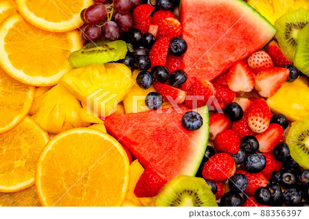 Fresh fruits background, Healthy mix fruits consist of tropical fruit and assorted berry 88356397