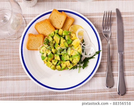 Salmon tartar with avocado Salmon tartar with avocado 88356558