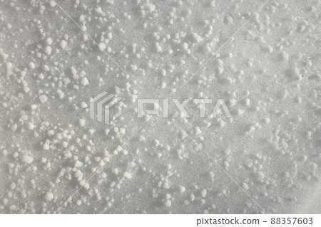 Close up of Graupel Snow pellets, formed when supercooled water droplets Freeze onto Snow Crystals 88357603