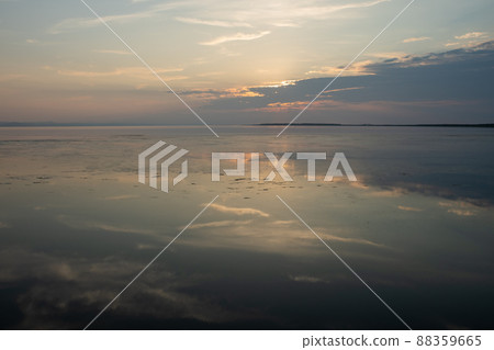 Quiet lake dusk and sunset clouds Quiet lake dusk and sunset clouds 88359665