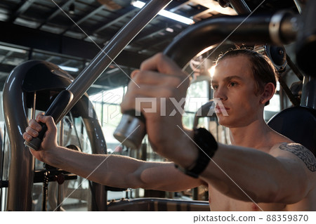 Fit Man Working Out in Gym Fit Man Working Out in Gym 88359870
