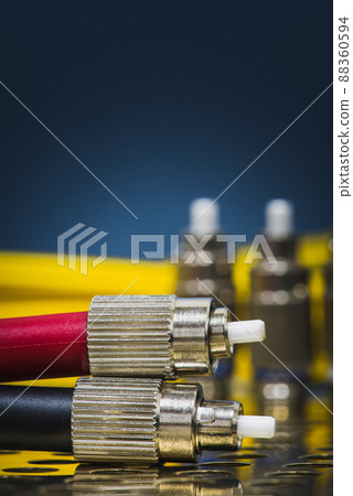 Fiber optic patch cord close-up, speed internet network telecom and technology Fiber optic patch cord close-up, speed internet network telecom and technology 88360594