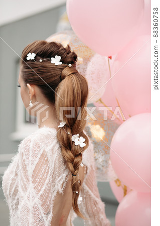 Slim stunning brunette with flowers in her hair 88360758